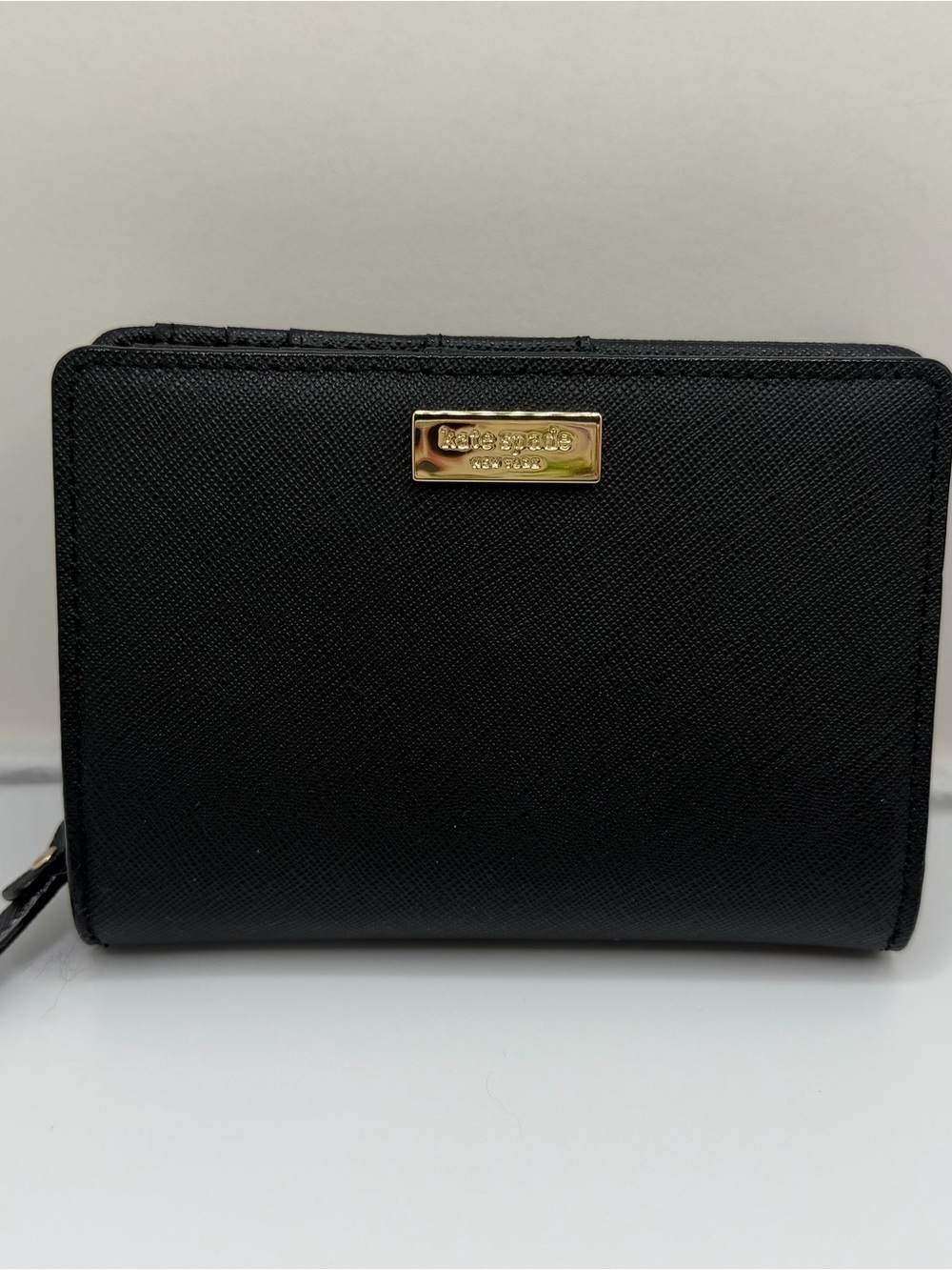 kate spade Black Zip-Around Saffiano Wallet with Gold Plaque